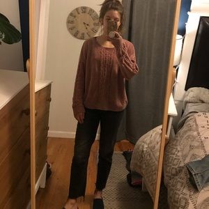 Pink velvety sweater with cable knit design